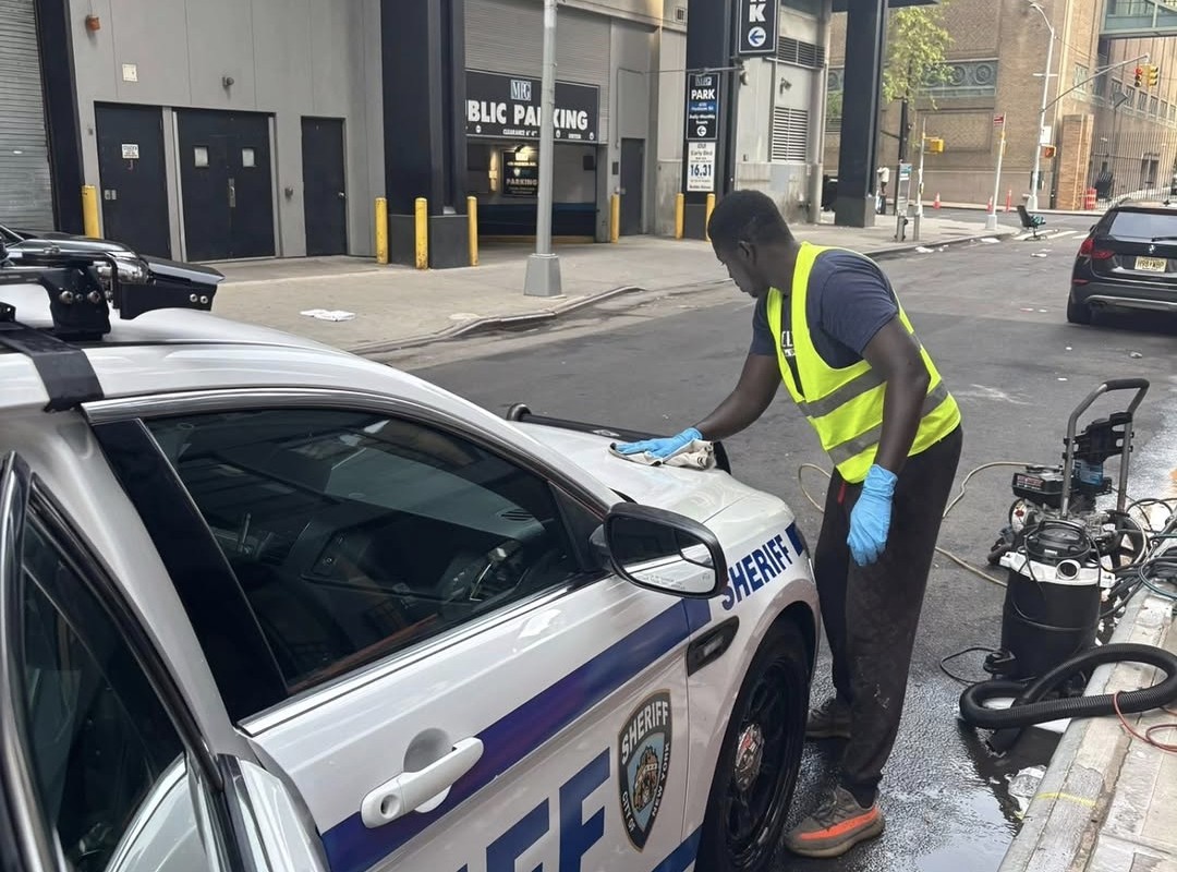 Team detailing a NYC Sheriff vehicle
